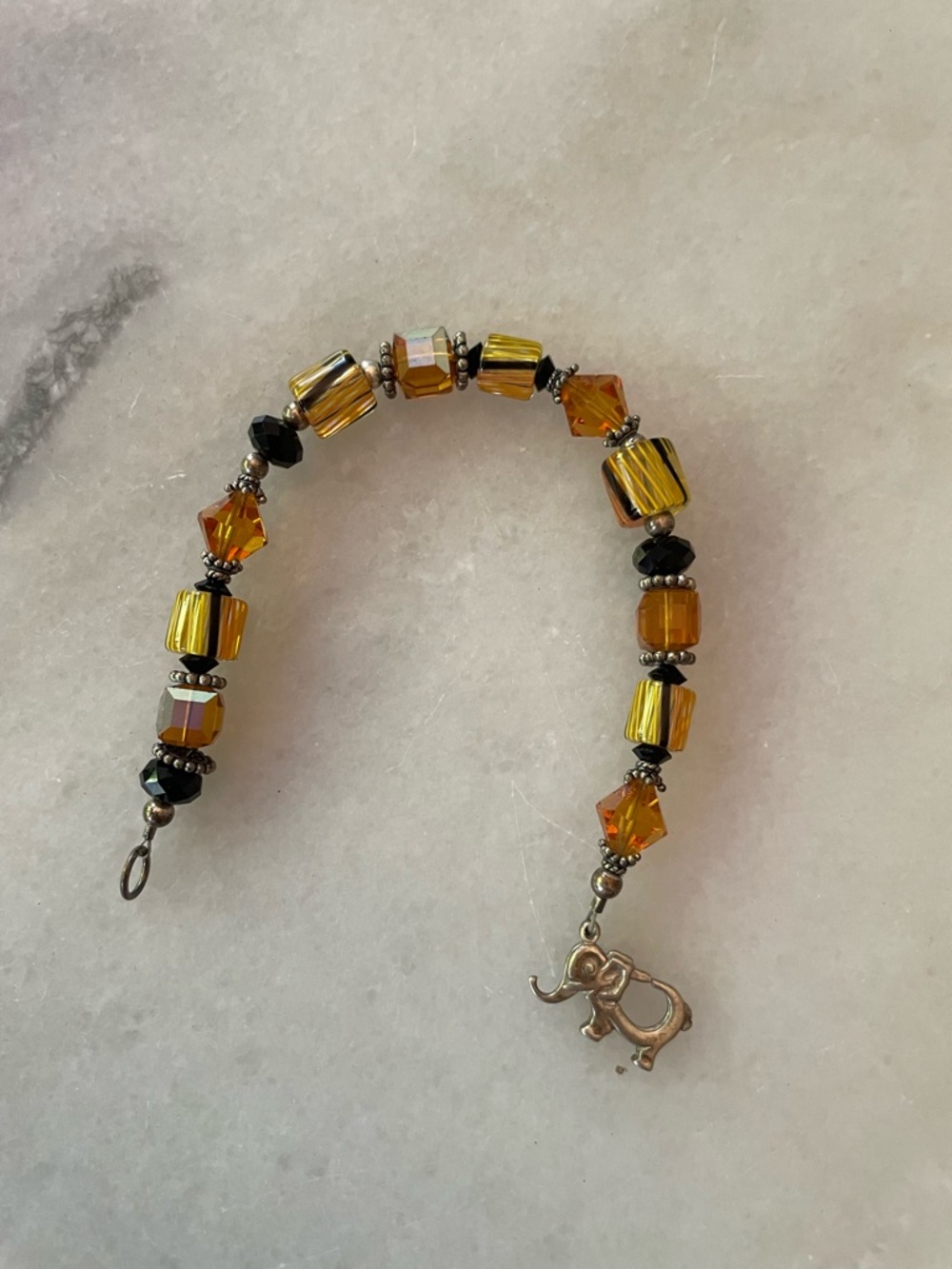 Gold and Amber Glass Bead Bracelet with Elephant Charm